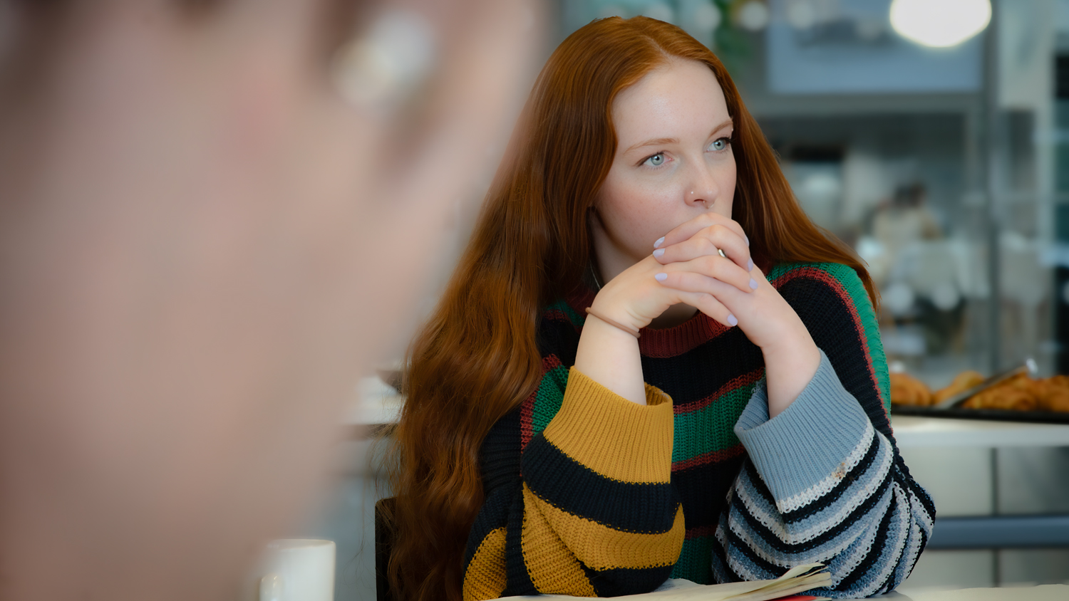 Zoe Cochrane listening